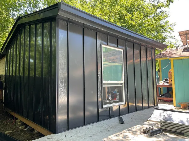 Black standing seam metal wall panels for Metal Roof Installation in Chadron