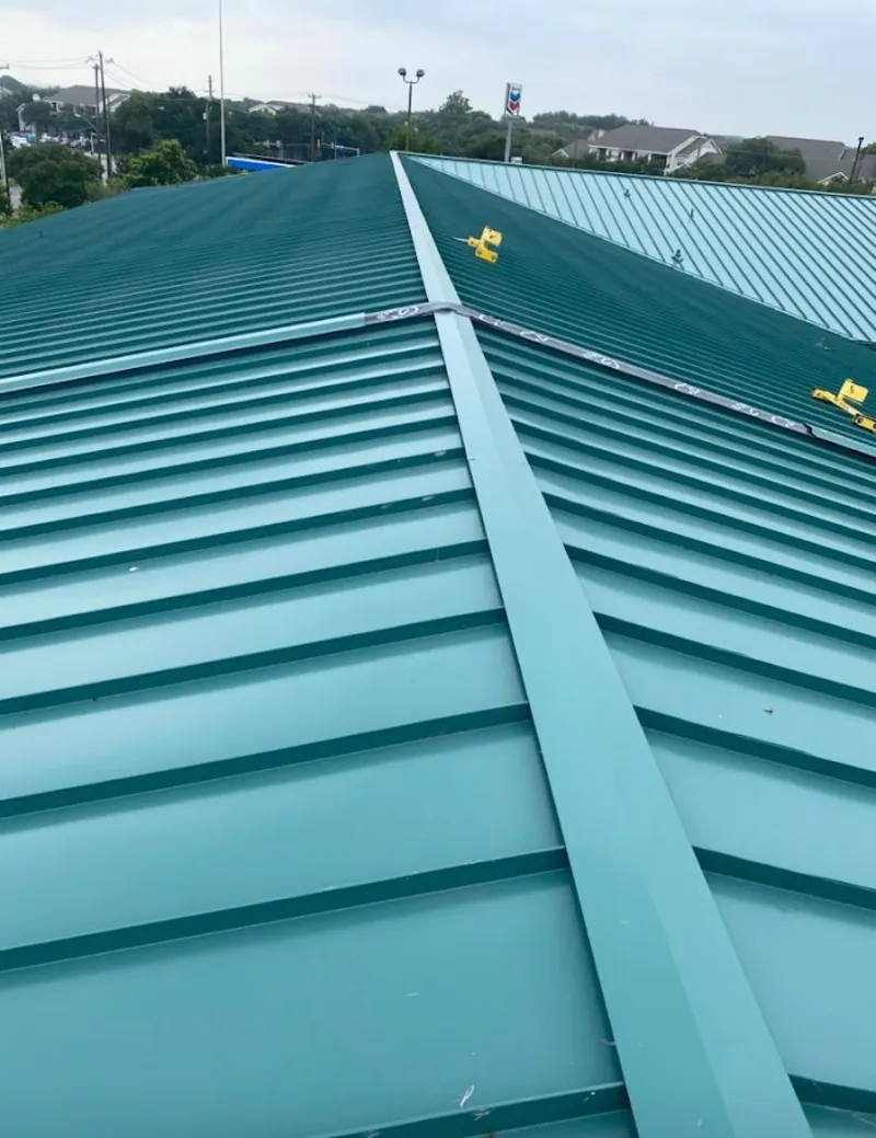 Green commercial metal roof ridge and valley for Metal Roof Repair in Chadron