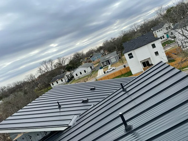Standing seam metal roof panels with vents for Skylight Repair in Chadron